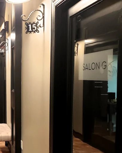 The etched-glass door of Salon G's private suite at Saah Salon Suites.